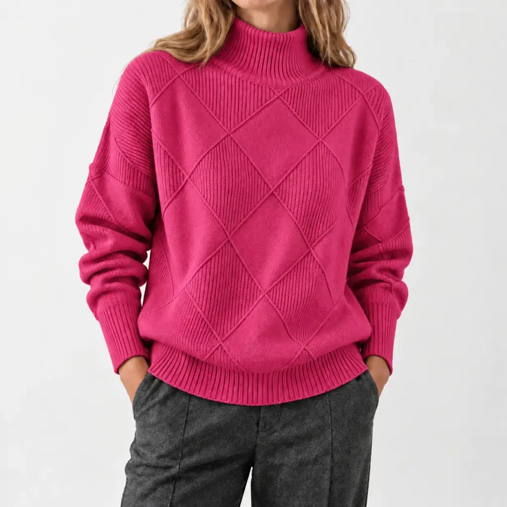 Lyselle coltrui met ruitpatroon in roze, gedragen met een grijze pantalon
