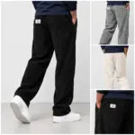 Ribbroek met rechte pijp in zwart, grijs en crème, met detail van de brede rib en het label